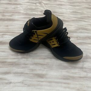 Nike Black and Gold Athletic Shoes